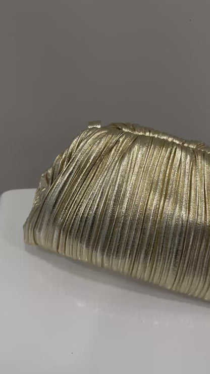 clutch oro laminata